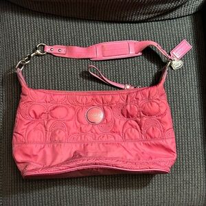 Coach Pink quilted small shoulder purse.